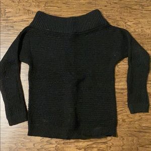 Express knot across the shoulder sweater